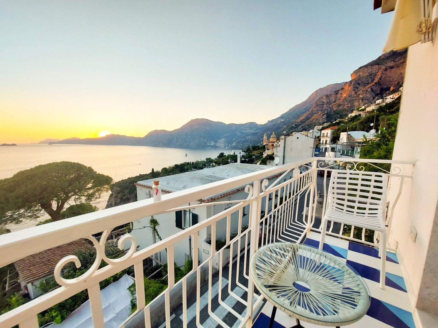 Balcony with sea view over Praiano at sunset