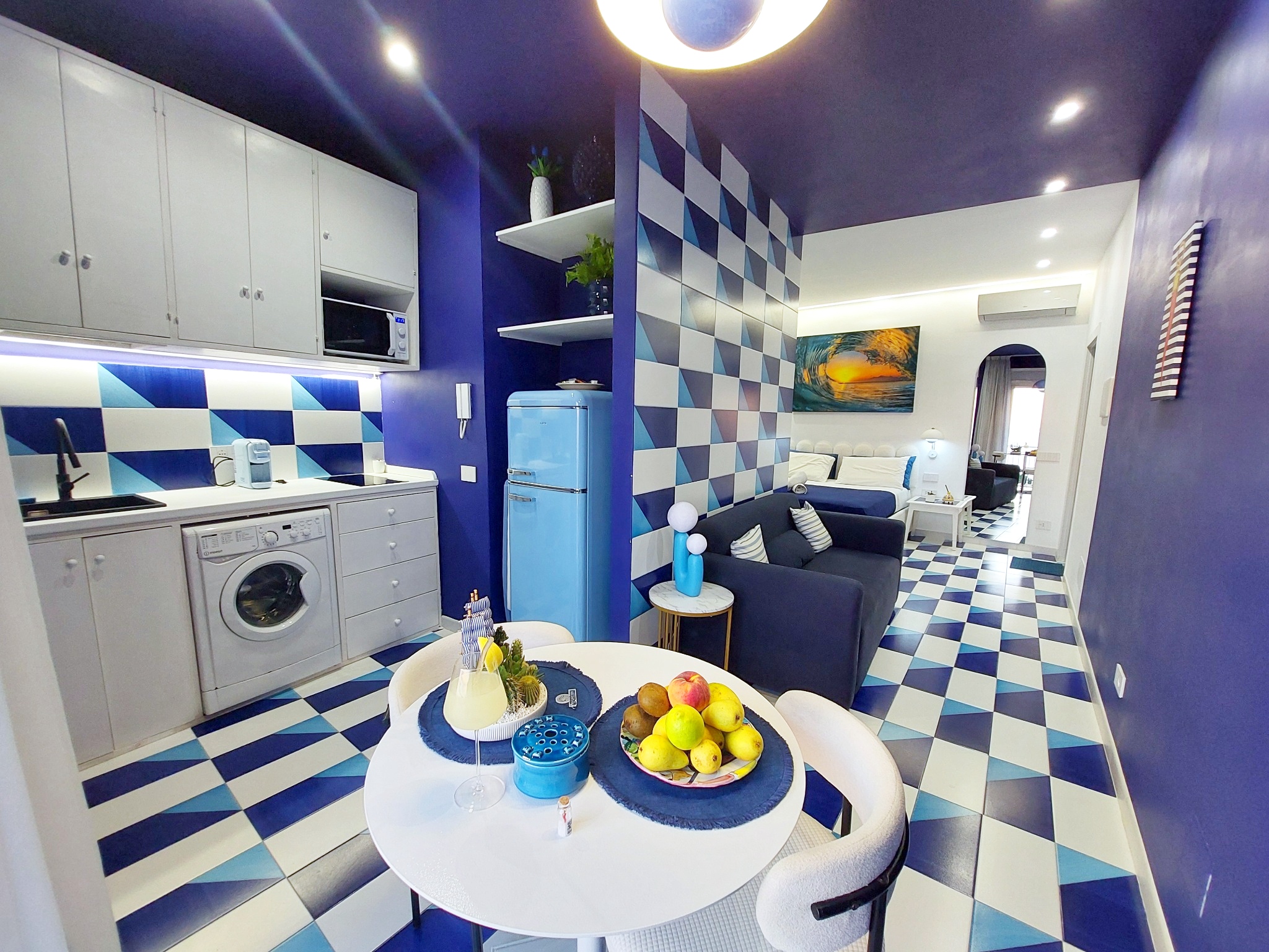 Kitchen, living area and bedroom